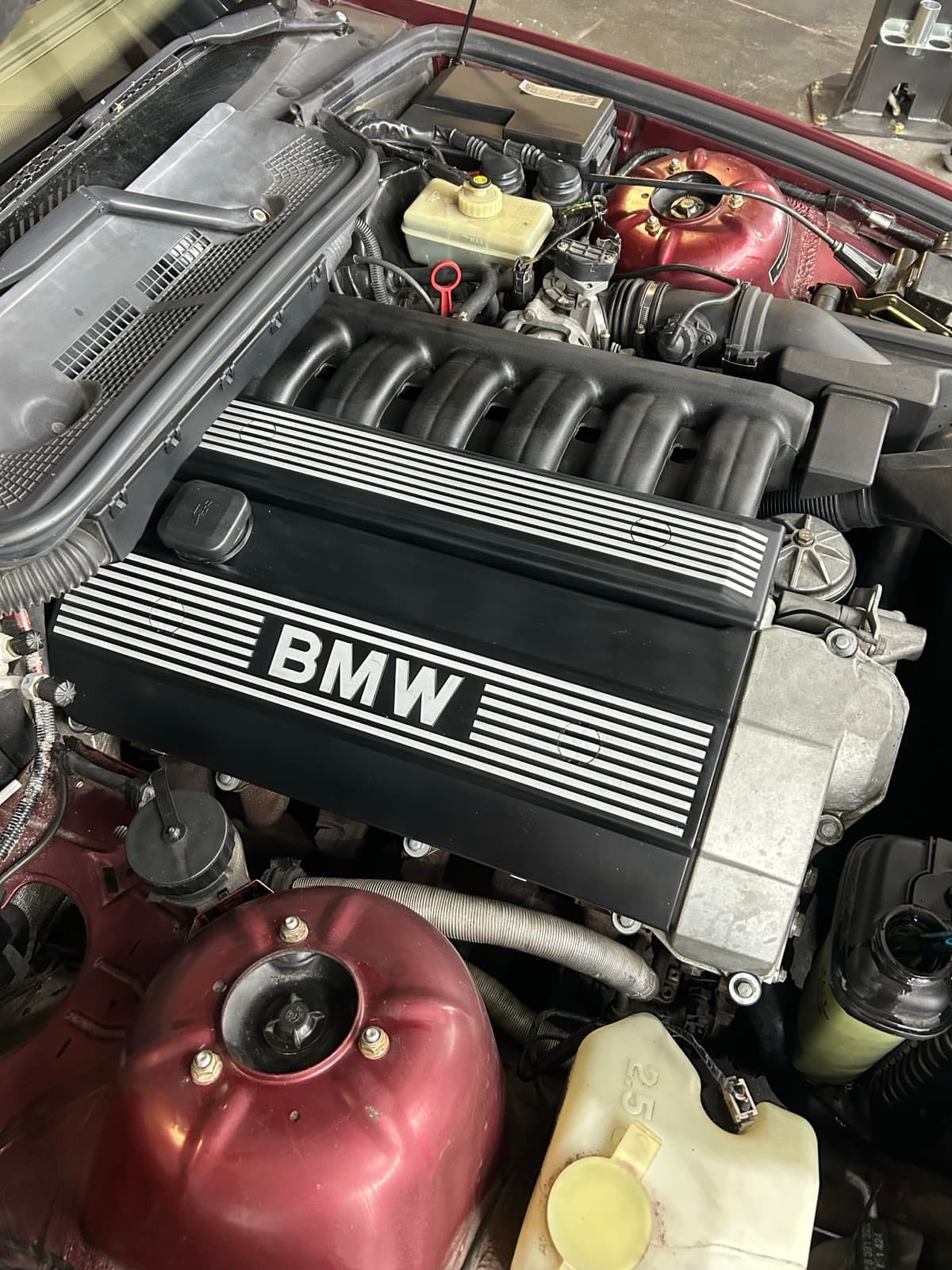BMW engine bay during service at Beloit Motor Werks